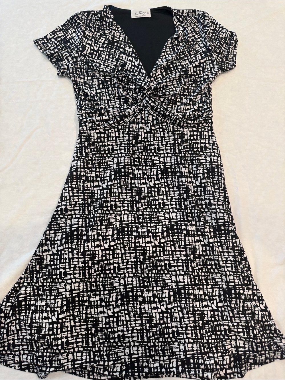 Kaileigh Black & White Twist-Front Midi Dress